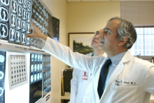 Dr. Nasser Altorki examines a CT scan of a patient's chest. Credit: Weill Cornell Medicine.